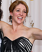 Sean Fine and Andrea Nix Fine pose with their Oscars after winning the Best Documentary Short Subject for their film 'Inocente' at the 85th Academy Awards in Hollywood, California