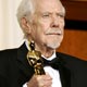 Robert Altman holds up his Oscar for lifetime achievement at the 78th annual Academy Awards