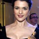 Rachel Weisz poses with her Oscar as she arrives at the Governors' Ball in Hollywood