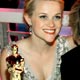 Witherspoon winner of the Oscar for best actress and her mother Betty pose together at the Governor's Ball in Hollywood