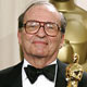 Director Sidney Lumet poses with his honorary Oscar at the 77th annual Academy Awards in Hollywood.