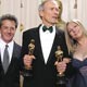 Best picture winners & presenters (L-R) producer Tom Rosenberg, presenter Dustin Hoffman, director Clint Eastwood, presenter Barbra Streisand, & producer Albert S. Ruddy.