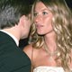 Actor Leonardo DiCaprio and his girlfriend, Brazilian supermodel Gisele Bundchen, talk at the Governor's Ball after the 77th annual Academy Awards.