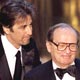 Director Sidney Lumet accepts an award from presenter Al Pacino at the 77th Academy Awards in Hollywood. Lumet won an honorary Oscar to honor his 'brilliant services to screenwriters, performers and the art of the motion picture.