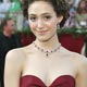 Actress Emmy Rossum smiles as she arrives for the 77th annual Academy Awards in Hollywood.