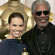 Actress Hilary Swank (L) and actor Morgan Freeman pose together after the 77th annual Academy Awards.