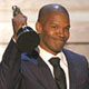 Jamie Foxx accepts his award for best actor for his performance in 'Ray' at the 77th annual Academy Awards.