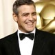 Best supporting actor Clooney reacts to winning Oscar at the 78th annual Academy Awards in Hollywood