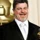 Argentinian composer Gustavo Santaolalla poses with his Oscar for best original score at the 78th annual Academy Awards