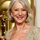 Helen Mirren poses with her Oscar for Best Actress for her work in The Queen backstage at the 79th Annual Academy Awards