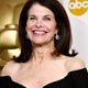 Jean Hersholt Humanitarian Award winner Sherry Lansing holds her Oscar backstage in Hollywood