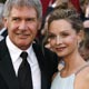 Actor Harrison Ford (L) and his girlfriend Calista Flockhart, dressed in Rare Vintage, pose on the red carpet at the 80th annual Academy Awards