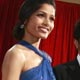 Cast members of best picture nominated film `Slumdog Millionaire` Anil Kapoor and Freida Pinto walk red carpet together at 81st Academy Awards in Hollywood