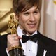 Dustin Lance Black holds his Oscar for best original screenplay, for the film `Milk,` at the 81st Academy Awards in Hollywood