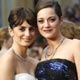 Penelope Cruz, best supporting actress nominee for `Vicky Cristina Barcelona,` and actress Marion Cotillard pose at 81st Academy Awards in Hollywood