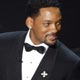 Presenter Will Smith stands with the visual effects Oscars during the 81st Academy Awards in Hollywood