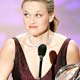 Actress Reese Witherspoon holds her award onstage at 32nd annual People's Choice Awards in Los Angeles