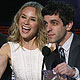 Presenters Eli Roth and Diane Kruger react as B.J. Novak announces Taylor Lautner as the winner of the Breakout Movie Actor category at the 2010 People`s Choice Awards in Los Angeles