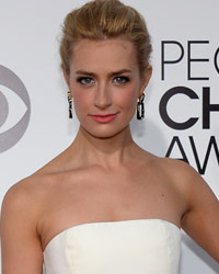 Show host, actress Beth Behrs, arrives at the 2014 People's Choice Awards in Los Angeles, California