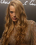 Model Petra Nemcova poses as she arrives for the launch of the Pirelli Calendar 2013 in Rio de Janeiro