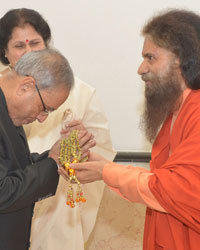 The President of India, Shri Pranab Mukherjee and Swami Chidanand Saraswati