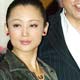 Director Chen Kaige (C), producer Chen Hong (L), and actress Cecilia Cheung (R) pose during a news conference for 'The Promise' in Shanghai, China