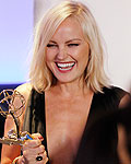 Malin Akerman holds her Emmy Award at the 2012 Primetime Creative Arts Emmy Awards in Los Angeles