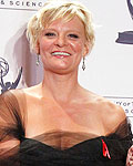 Martha Plimpton poses with her Emmy Award backstage at the 2012 Primetime Creative Arts Emmy Awards in Los Angeles