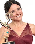 Julia Louis-Dreyfus holds the award for outstanding lead actress in a comedy series for her role in 'Veep' at the 64th Primetime Emmy Awards in Los Angeles