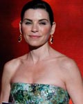 Presenter Julianna Margulies takes the stage to hand out the award for outstanding lead actor in a drama series at the 64th Primetime Emmy Awards in Los Angeles