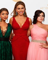 Actors Julie Bowen Sarah Hyland, Sofia Vergara, Ariel Winter and Aubrey Anderson Emmons from ABC's series 'Modern Family' pose backstage after winning the Outstanding Comedy Series award at the 65th Primetime Emmy Awards in Los Angeles