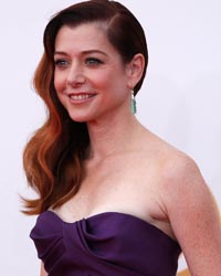 Actress Alyson Hannigan, from the CBS sitcom 'How I Met Your Mother,' arrives at the 65th Primetime Emmy Awards in Los Angeles