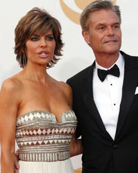 Actors Lisa Rinna and Harry Hamlin arrive at the 65th Primetime Emmy Awards in Los Angeles