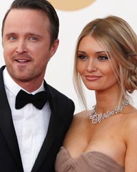 Actor Aaron Paul from AMC's series 'Breaking Bad' arrives with his wife Lauren Parsekian at the 65th Primetime Emmy Awards in Los Angeles