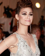 Actress Emmy Rossum arrives at the Metropolitan Museum of Art Costume Institute Benefit celebrating the opening of 'PUNK- Chaos to Couture' in New York