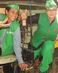 Rakhi Sawant follows her manifesto and drives around town with women autorickshaw driver