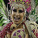 A reveller from the Mangueira samba school participates on the second night of the annual Carnival parade in Rio de Janeiro's Sambadrome