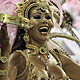 A reveller from the Mangueira samba school takes part in the second night of the annual Carnival parade in Rio de Janeiro's Sambadrome