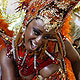 A reveller from the Portela samba school parades on the first night of the annual Carnival parade in Rio de Janeiro's Sambadrome