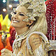 Revellers from the Mocidade samba school parade on the first night of the annual Carnival parade in Rio de Janeiro's Sambadrome