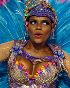 A reveller from the Vila Isabel samba school participates in the annual Carnival parade in Rio de Janeiro's Sambadrome