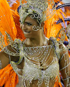 A reveller of the Salgueiro samba school participates on the first night of the annual carnival parade in Rio de Janeiro's Sambadrome