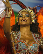 A reveller from the Beija Flor samba school participates during the annual carnival parade in Rio de Janeiro's Sambadrome