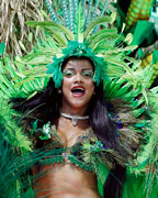 A reveller from the Beija Flor samba school participates during the annual Carnival parade in Rio de Janeiro's Sambadrome