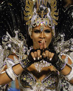 A reveller of Mocidade Independente samba school participates in the annual Carnival parade in Rio de Janeiro's Sambadrome