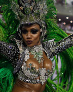 A reveller of Mocidade Independente samba school participates in the annual Carnival parade in Rio de Janeiro's Sambadrome