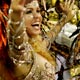 Bruna Almeida, drum queen of the Sao Clemente samba school, dances during the first night of parades by the top samba groups in Rio de Janeiro`s Sambadrome