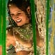 A reveller of the Vila Isabel samba school dances atop a float on the second night of parade by the top samba groups in Rio de Janeiro`s Sambadrome