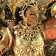 Revellers of Viradouro samba school ride atop a float during first night of parades in Rio de Janeiro`s Sambadrome