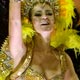 Revelers of the Portela samba school dance atop a float during the first night of parade by the top samba groups in Rio de Janeiro`s Sambadrome